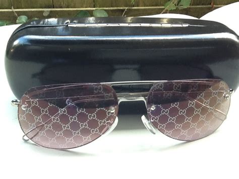 gucci monogram lens sunglasses.